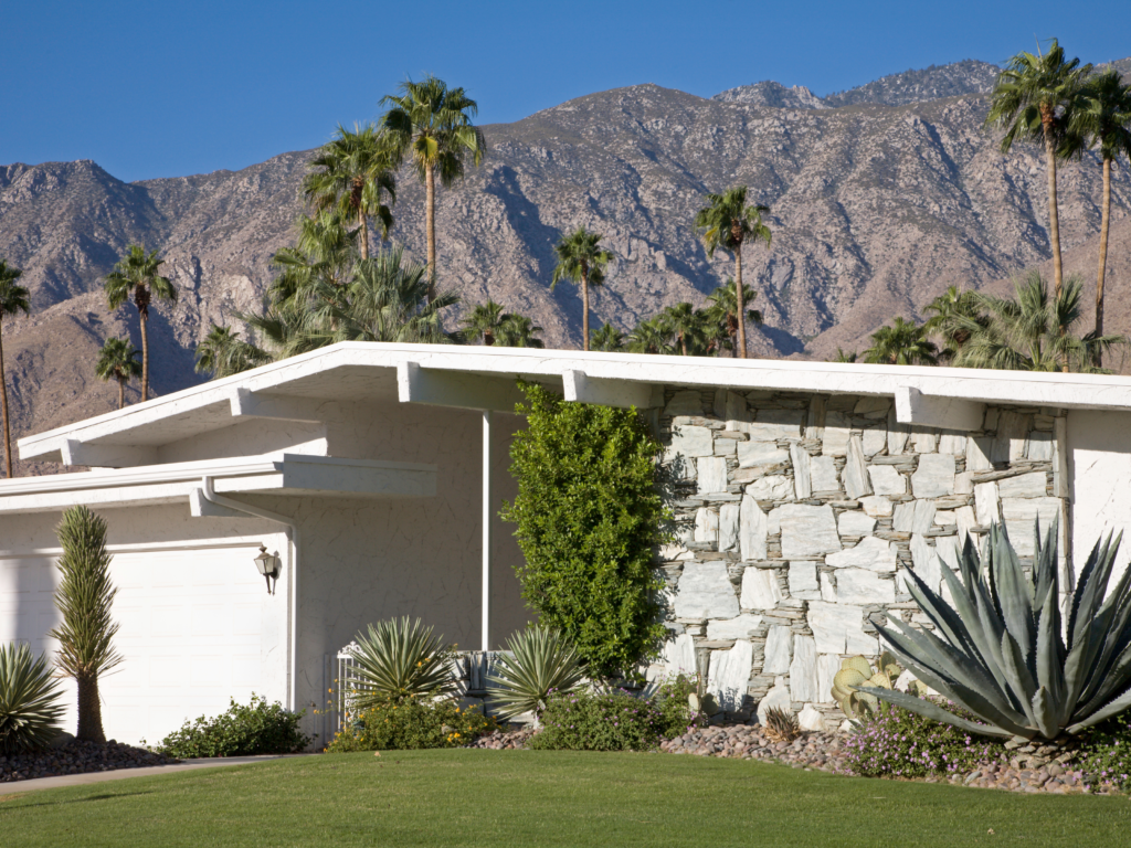 Mid-century modern home exterior. Indicates a style of home someone would have owned in the 1970's. A time period which is referenced in the following paragraph. 